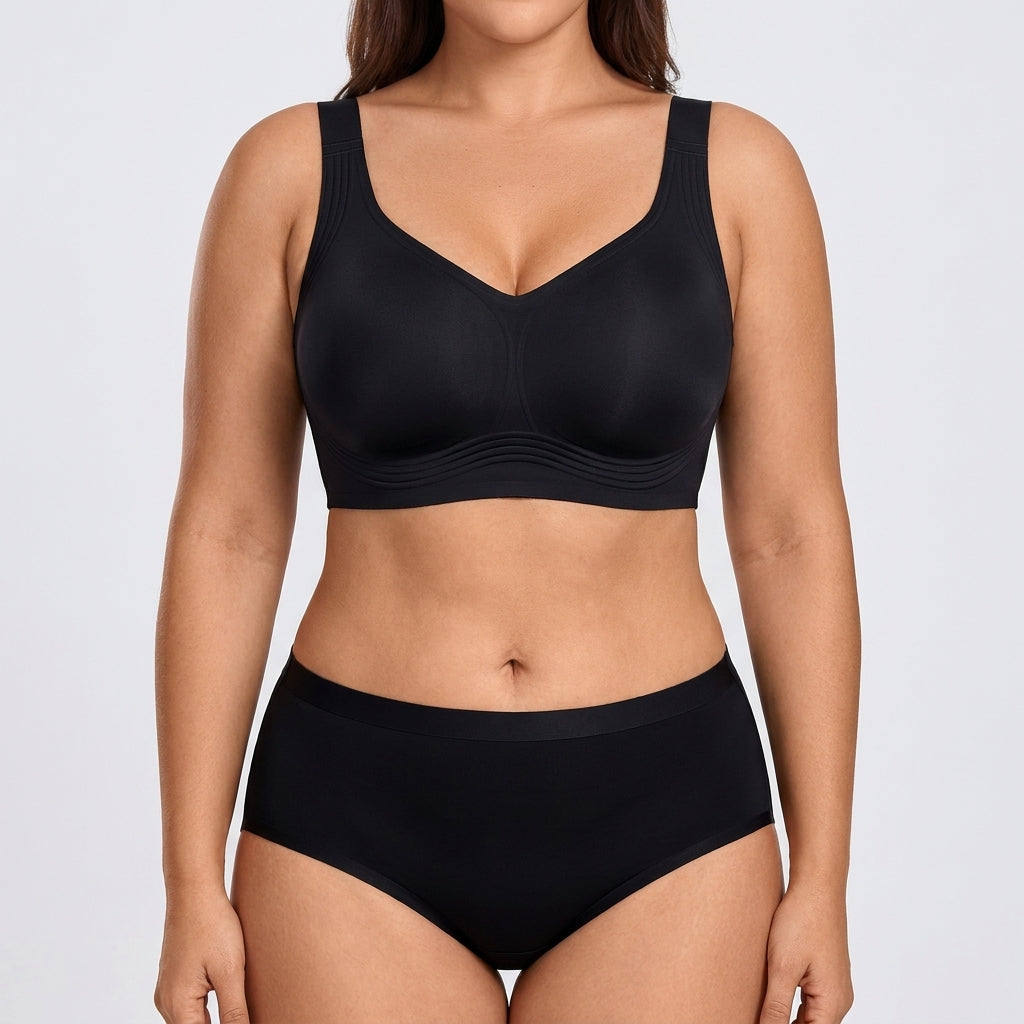 Seamless Mid-Rise Brief - Black on model, front #Color_Black
