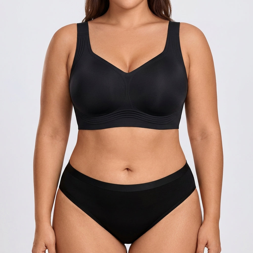 Seamless Mid-Rise Bikini - Black on model, front #Color_Black