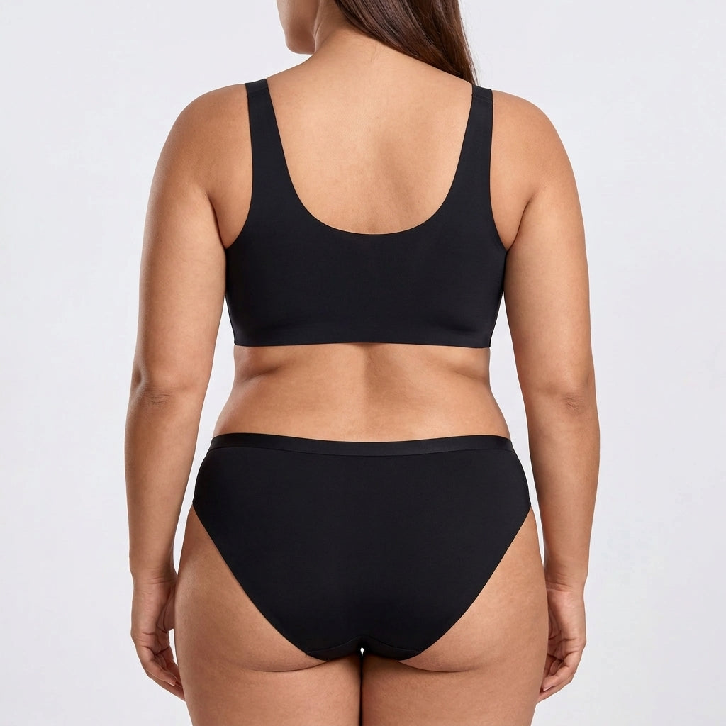 Seamless Mid-Rise Bikini - Black on model, back #Color_Black