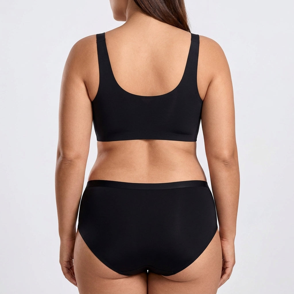 Seamless Mid-Rise Brief - Black on model, back #Color_Black