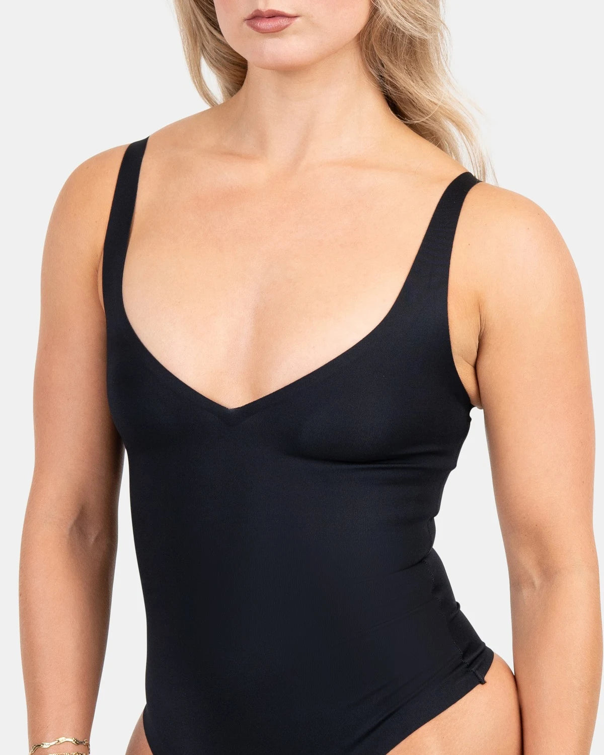 Seamless Sculpt Bodysuit in Black, close-up #color_black